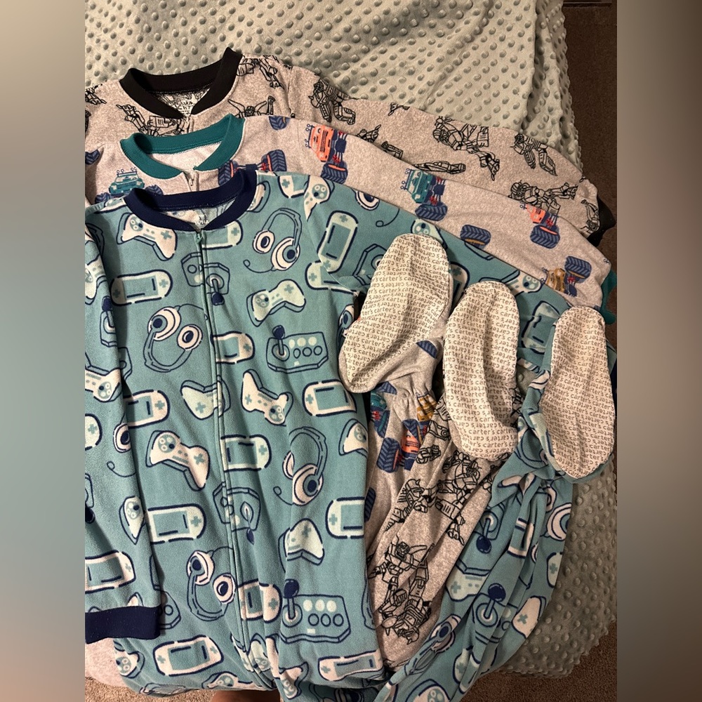 GUC Carters Size 14 footy pjs. Only selling as a lot of 3.